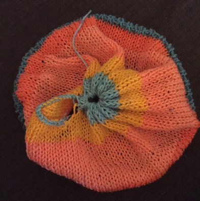 Hat with knit hole